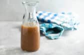 Caramel sauce in a carafe.