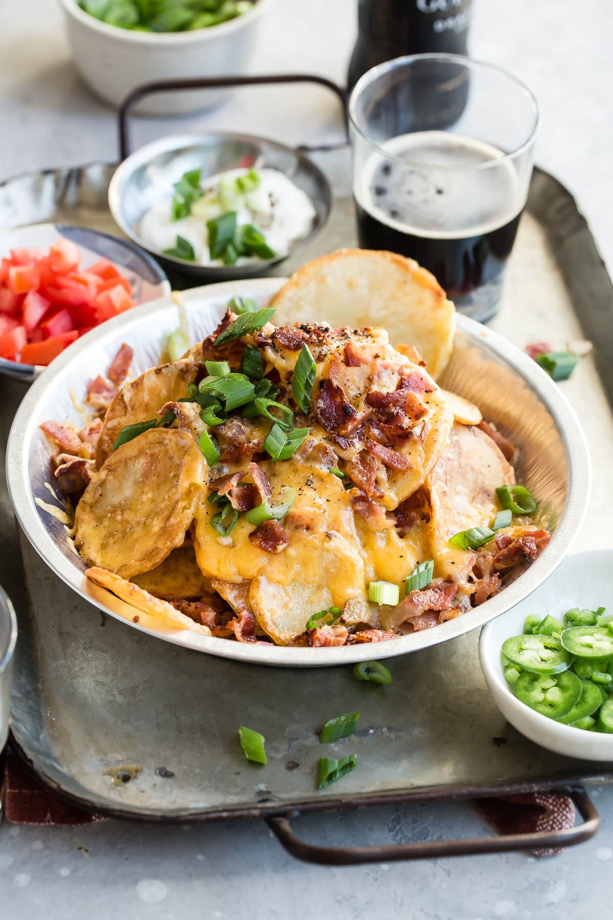 Irish nachos in a silver serving dish.