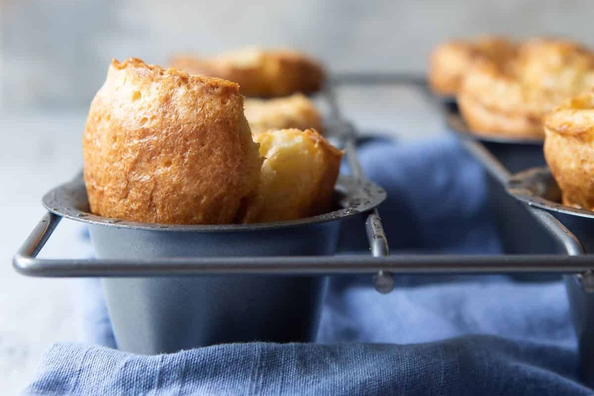 Baked popovers in a popover pan.