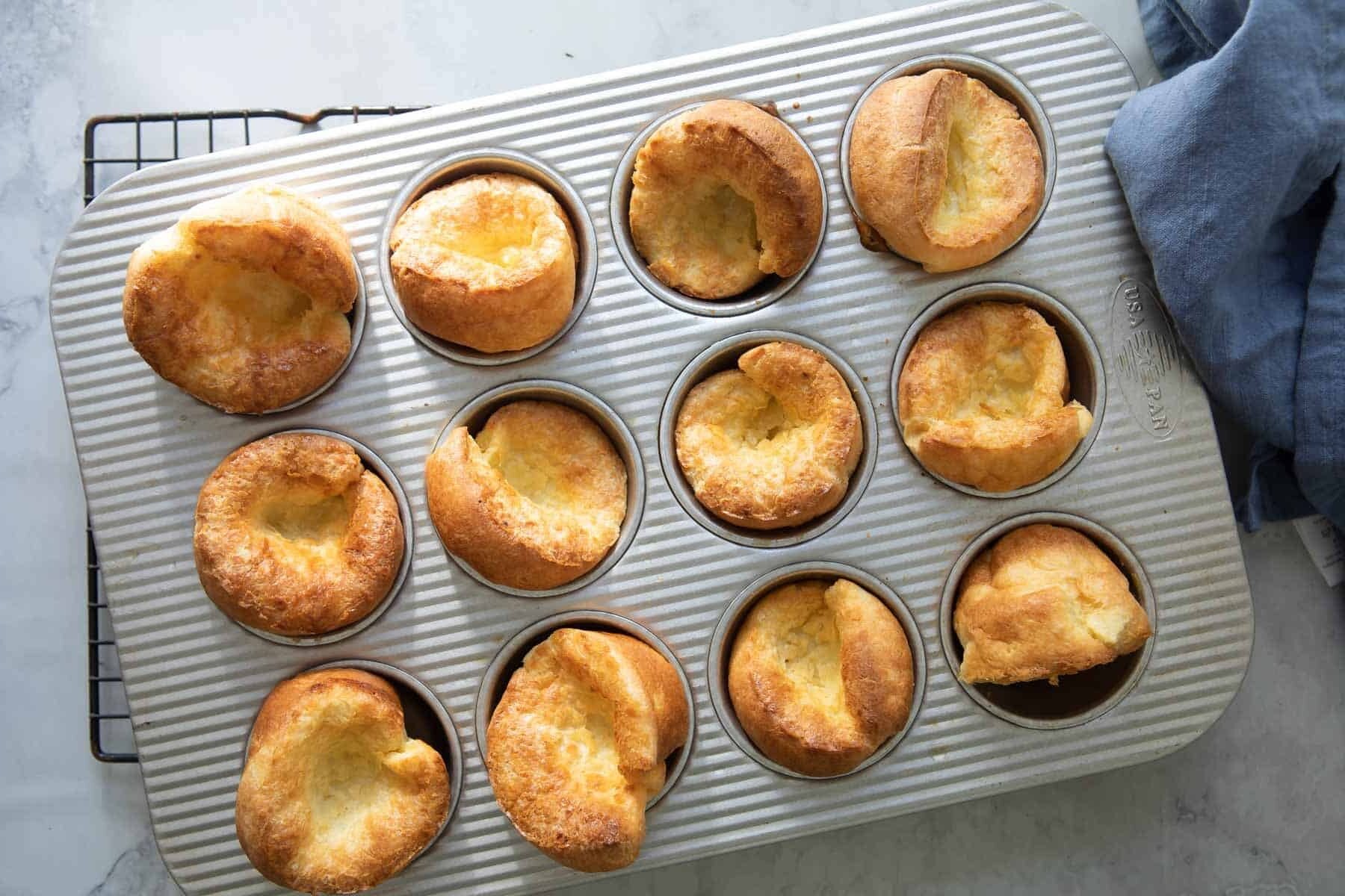Baked popovers in a muffin pan.