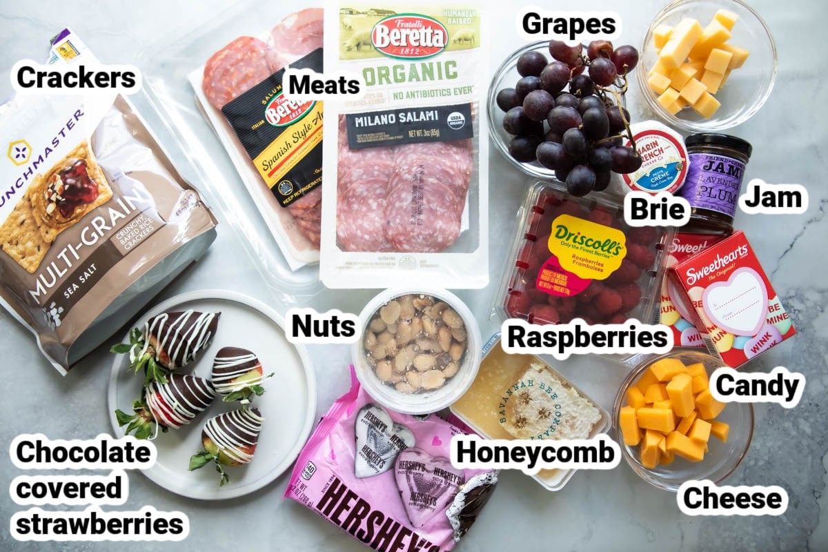 Ingredients labeled for a Valentine's Day charcuterie board.