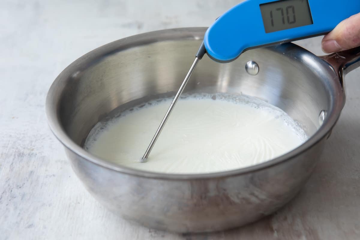 A saucepan full of scalded milk.