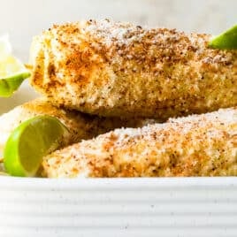 Ears of Mexican Street Corn in a dish.