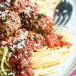 A platter of spaghetti and meatballs.