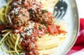 A platter of spaghetti and meatballs.