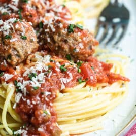 A platter of spaghetti and meatballs.