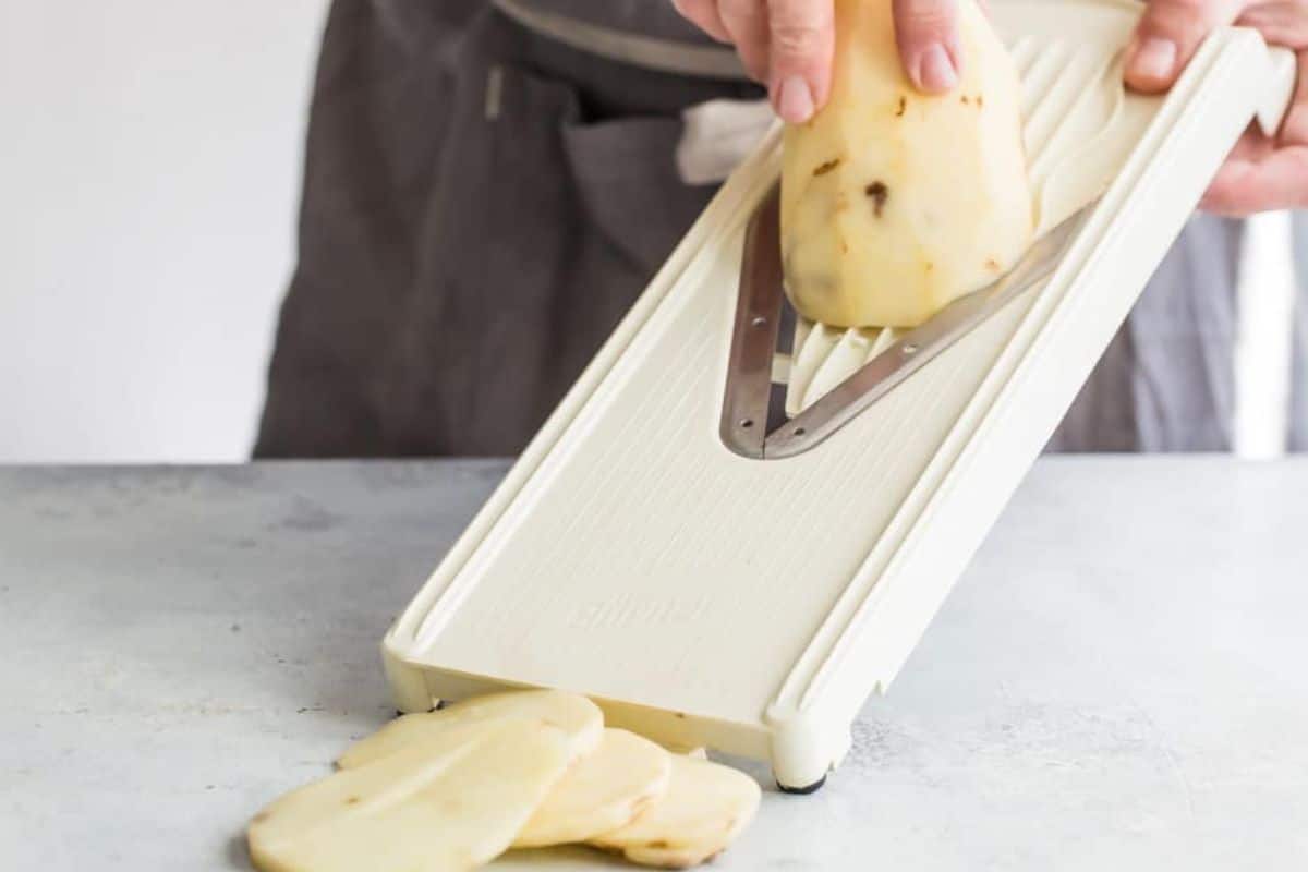Potatoes being sliced