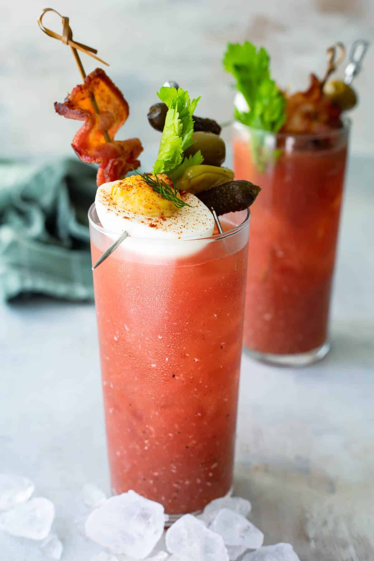Two bloody mary cocktails.