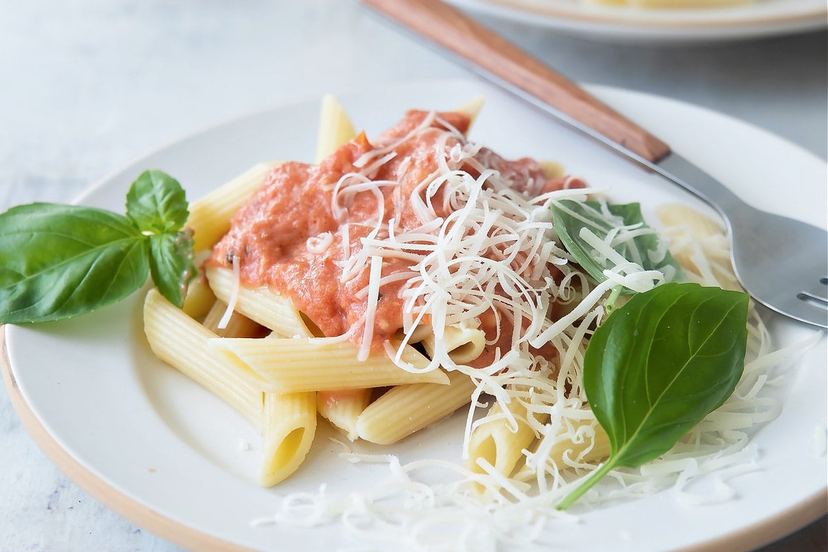 A plate with penne pasta with Parma Rosa sauce.