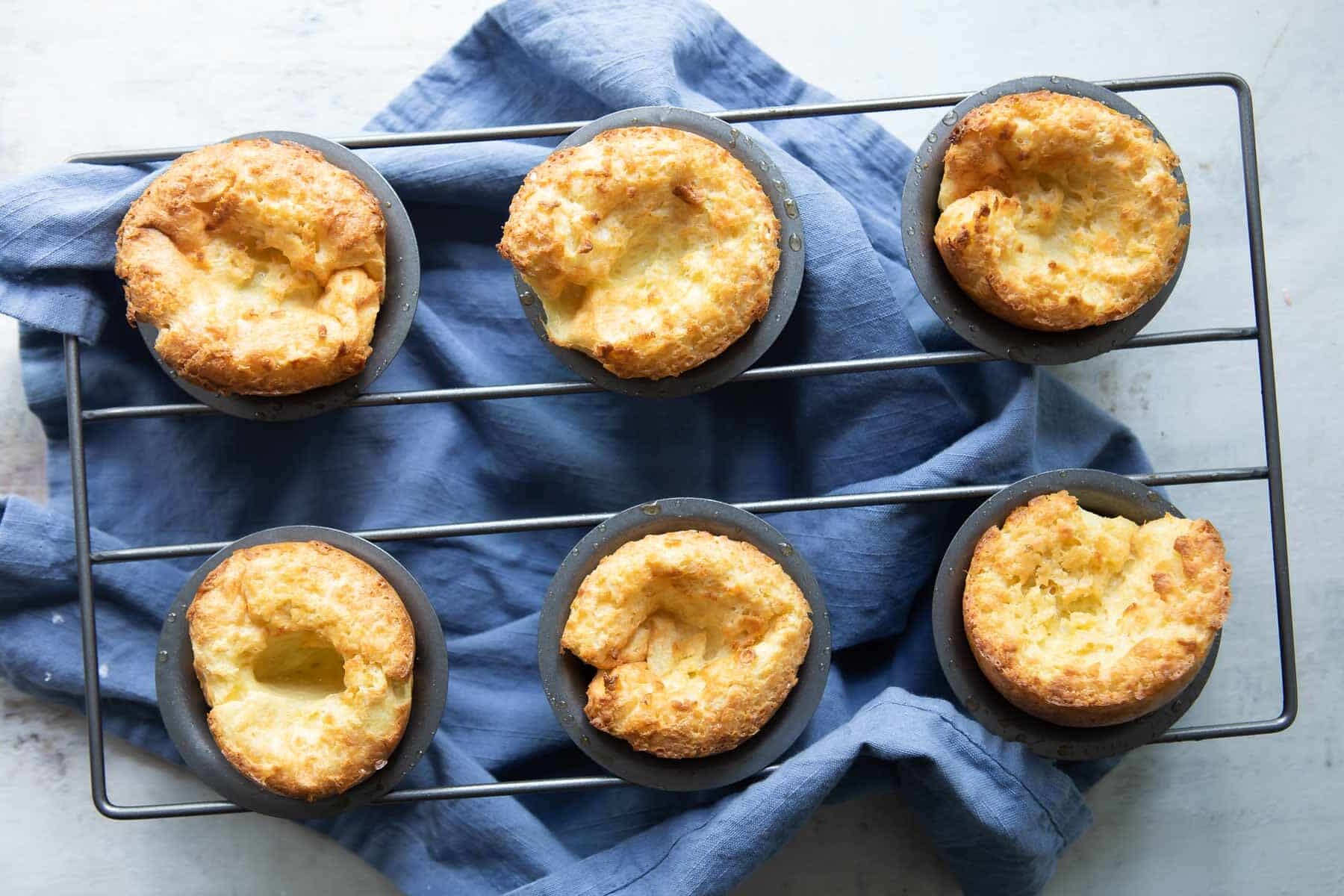 Baked popovers in a popover pan.