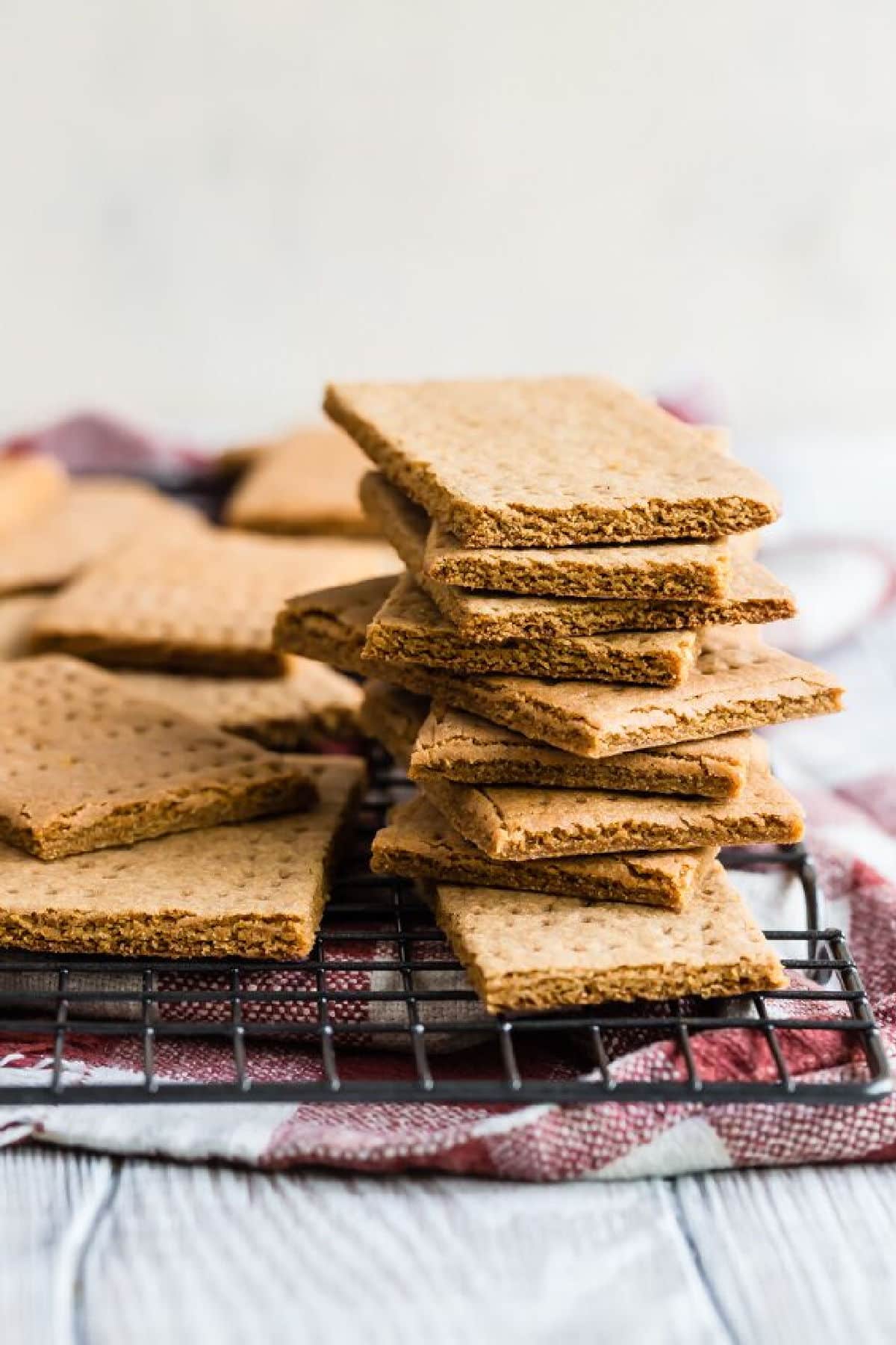 Homemade graham crackers on a cooling rack.