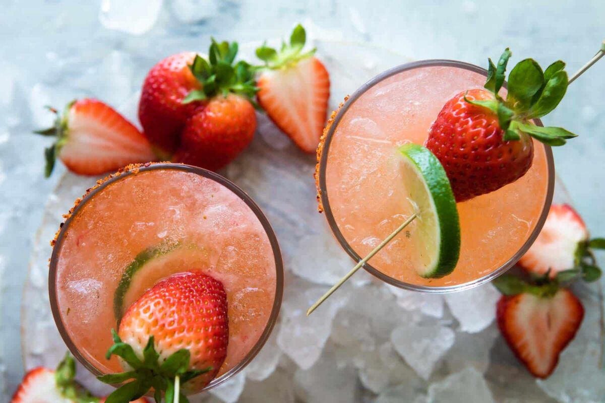 Two strawberry palomas in glasses.