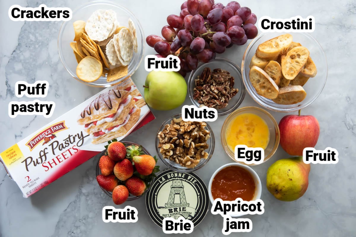 Labeled ingredients for baked brie in puff pastry.