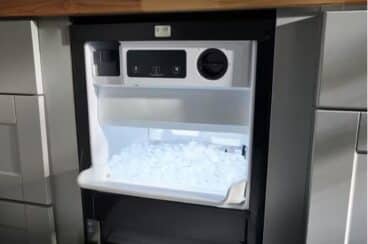 An under counter icemaker.