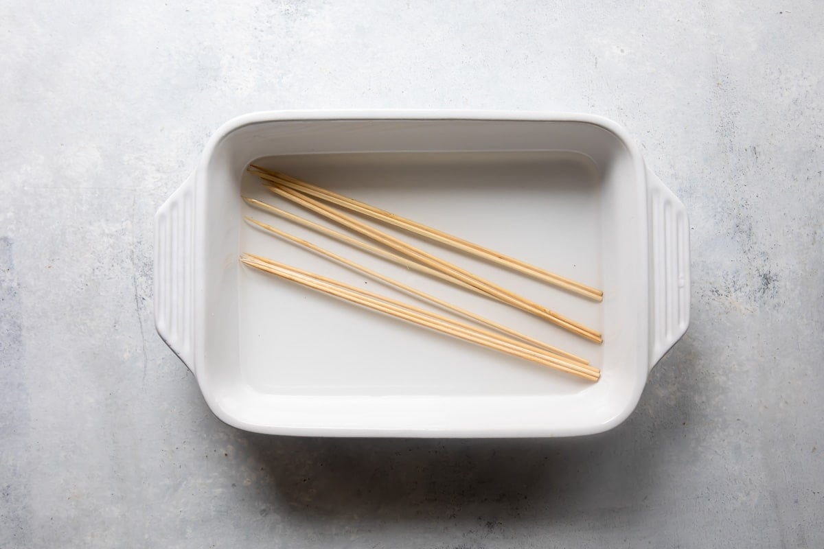 Wooden skewers soaking in water.
