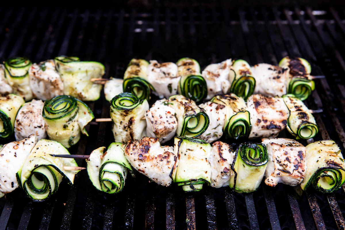 Chicken kabobs being grilled.