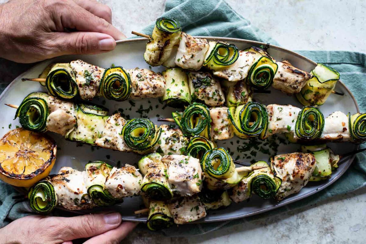 Chicken kabobs on a serving platter.