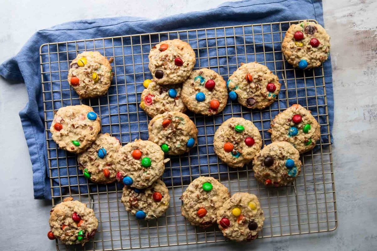 Cowboy cookies on a cooling rack.