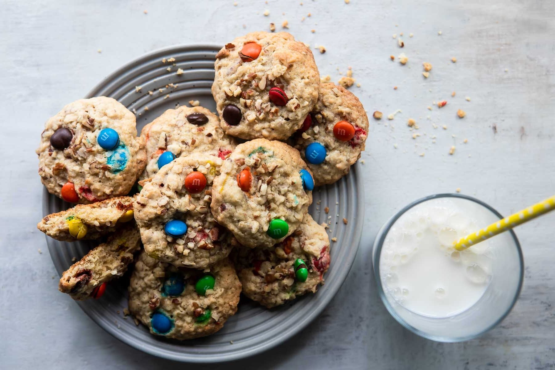 Cowboy cookies on gray plate.