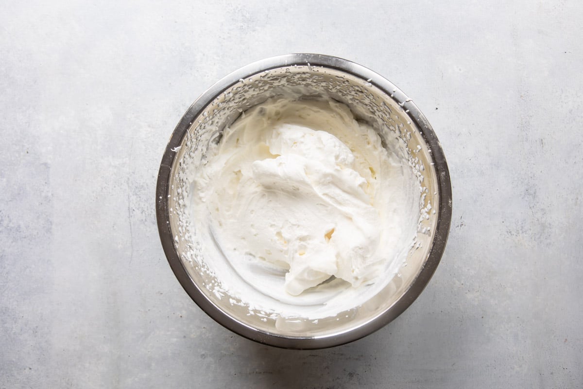 Cheesecake mixture in a mixing bowl.
