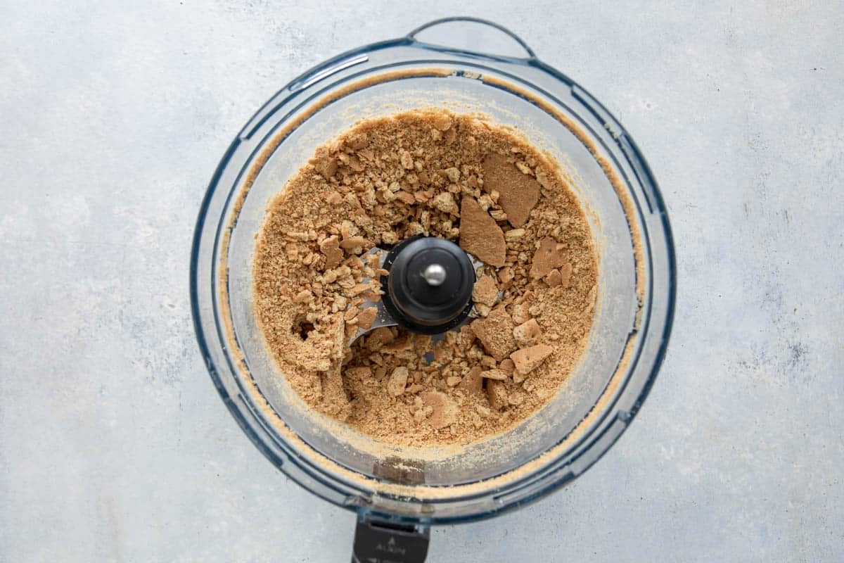 Coarse graham cracker crumbs in a food processor.