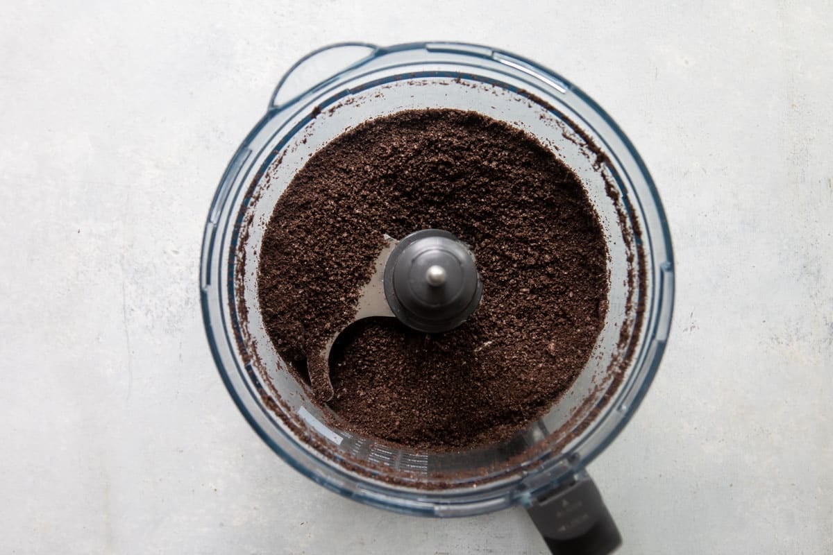 Oreo crumbs in a food processor.