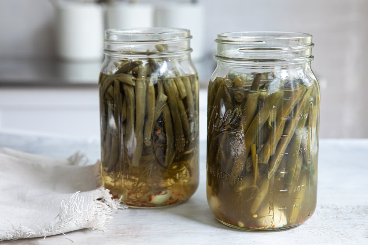 Pickled green beans in mason jars.