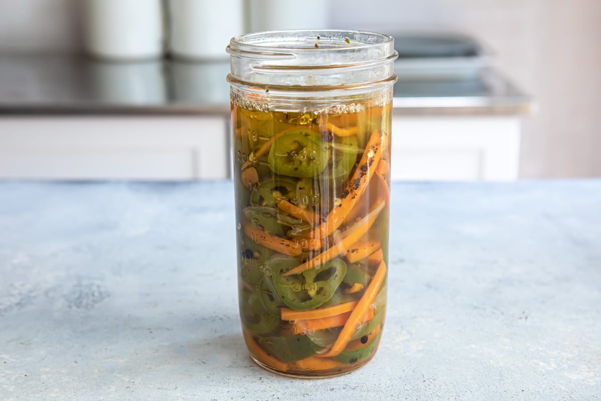 A jar of pickled jalapeños.
