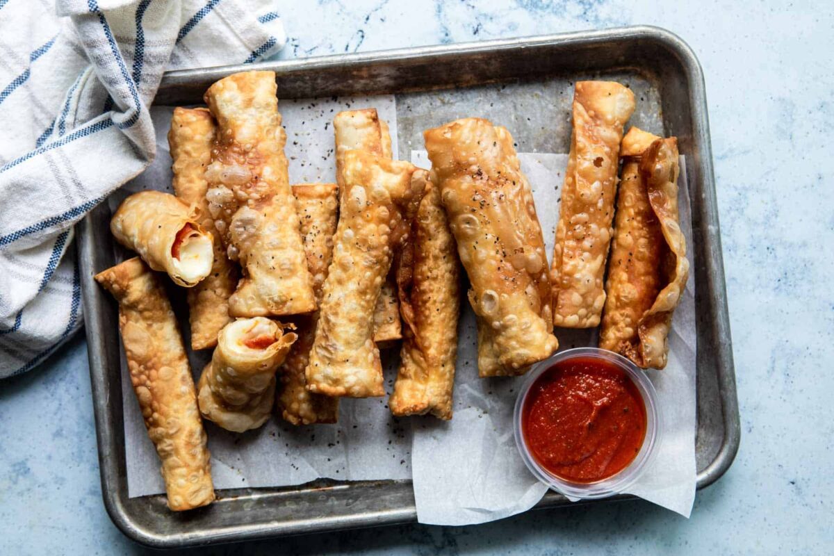 Pizza sticks on a small baking sheet.