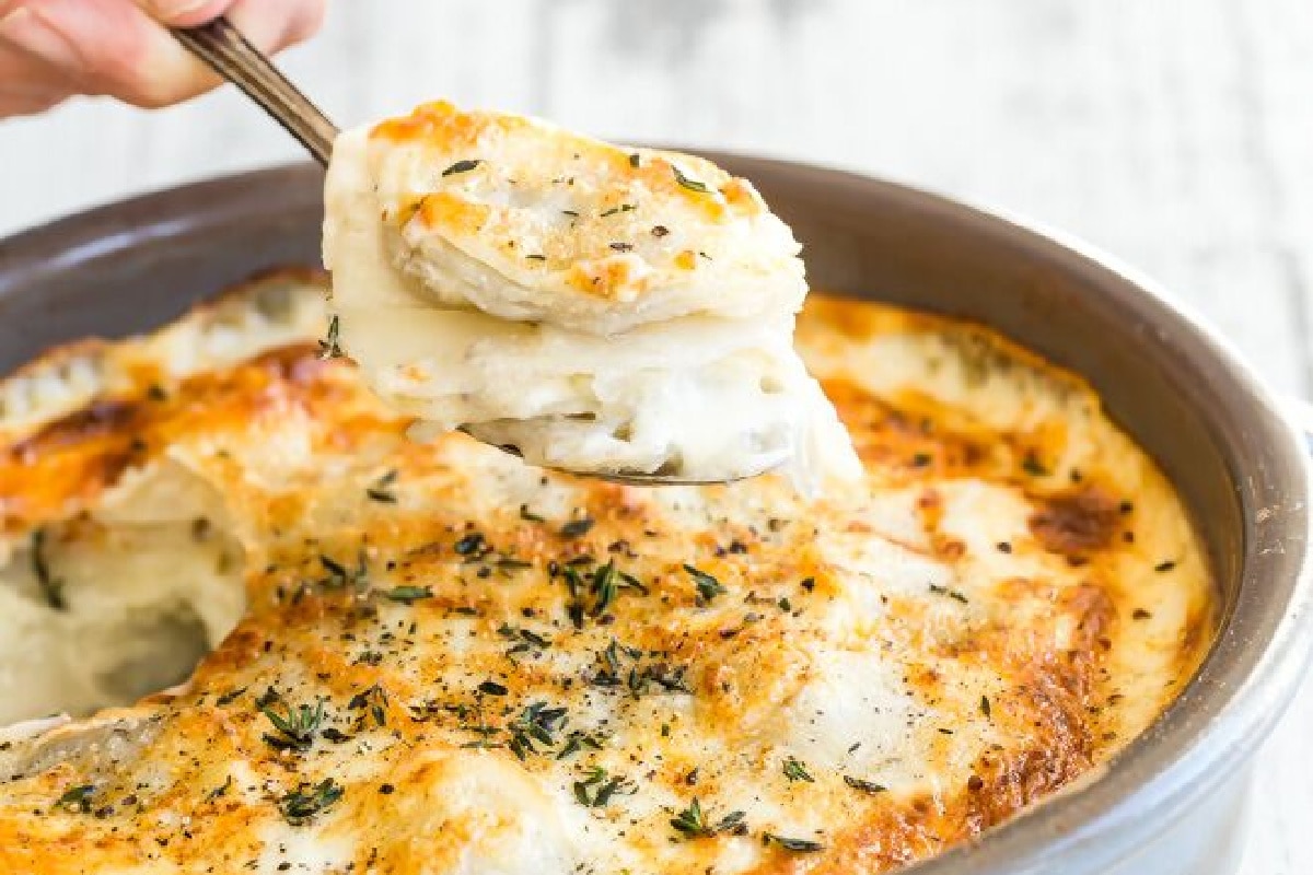A baking dish full of Au Gratin potatoes.