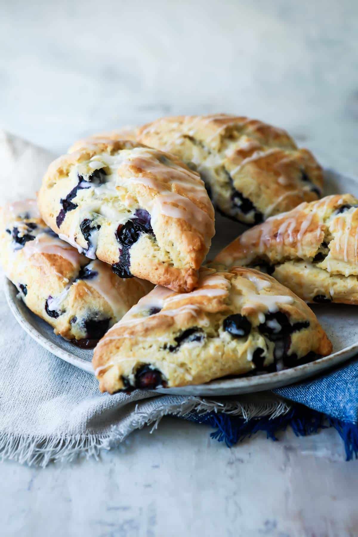 A plate of blueberry scones.