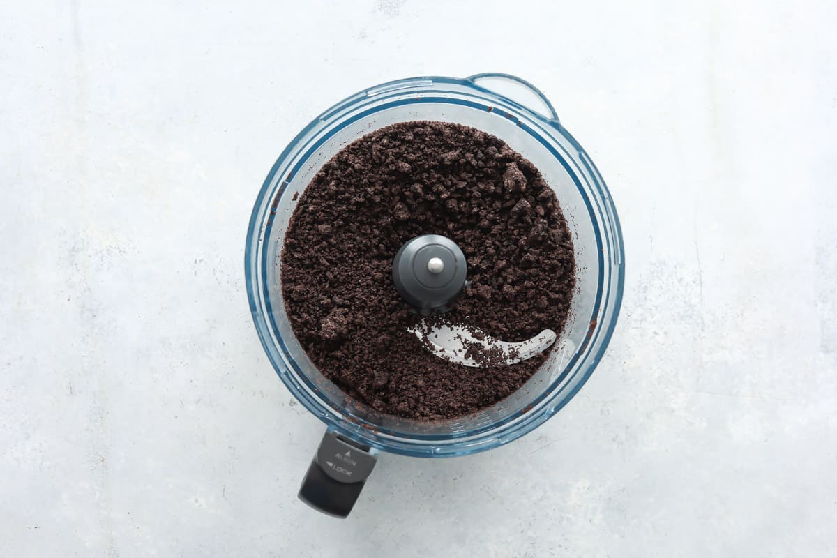 Crushed oreos in a food processor.