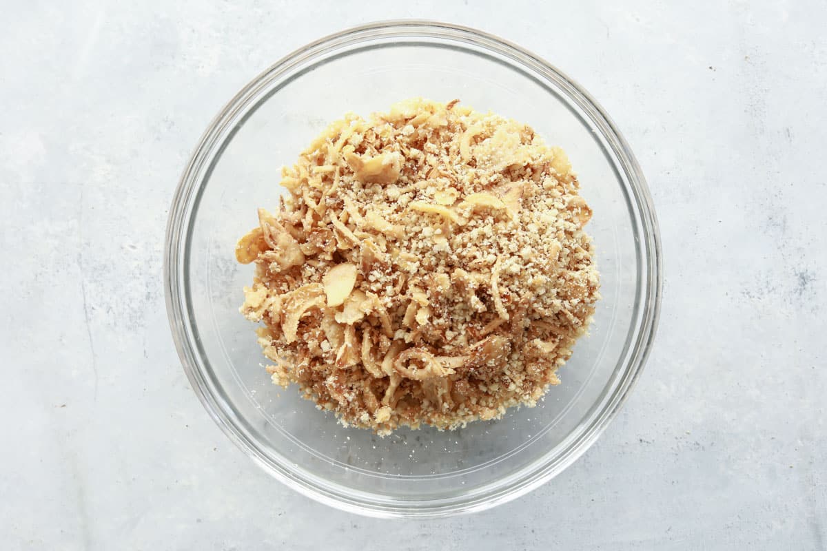 A bowl of bread crumbs and French fried onions.