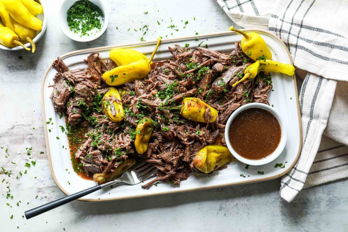 Mississippi pot roast on a rectangular platter.