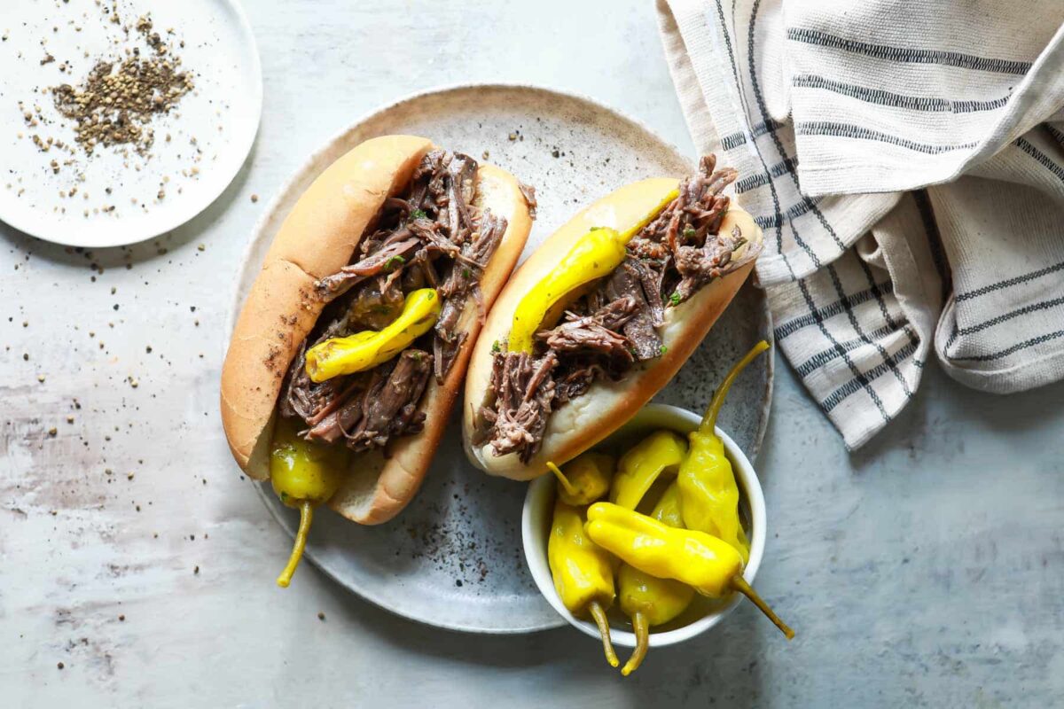 Two Mississippi pot roast sandwiches on a plate.