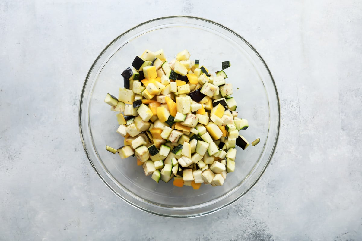 A bowl of diced vegetables for ratatouille.