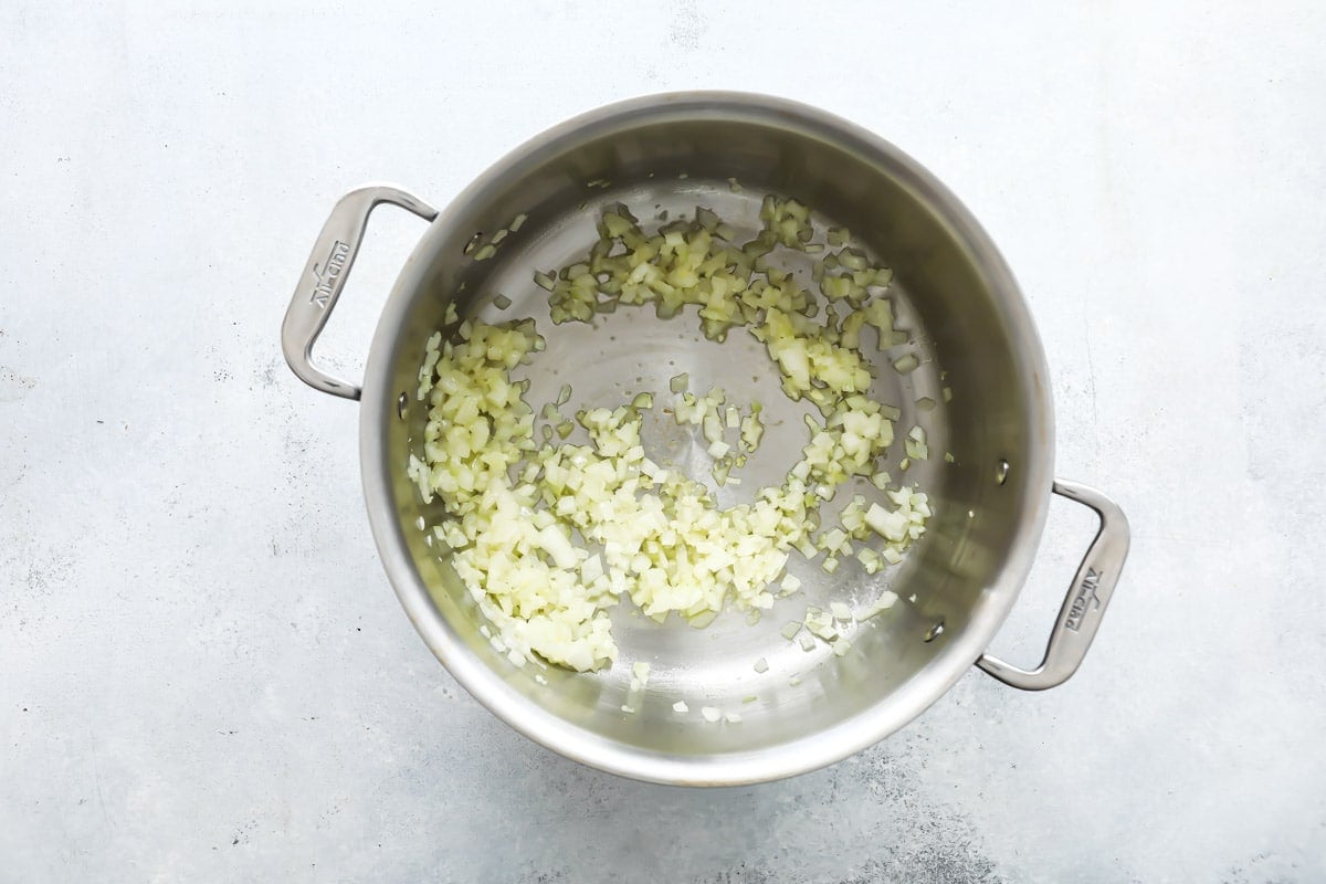 Garlic cooking in a stock pot.