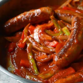 A skillet of sausage and peppers.