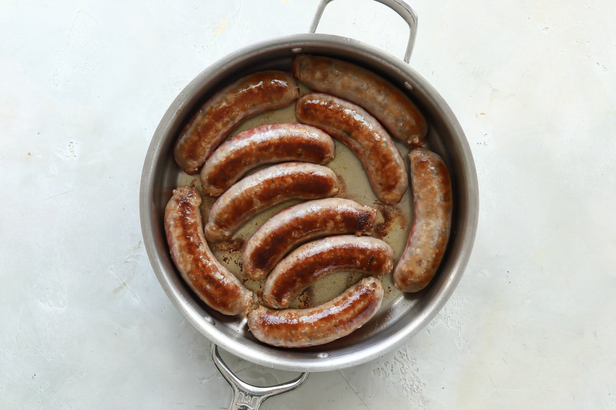 A skillet of sausages.