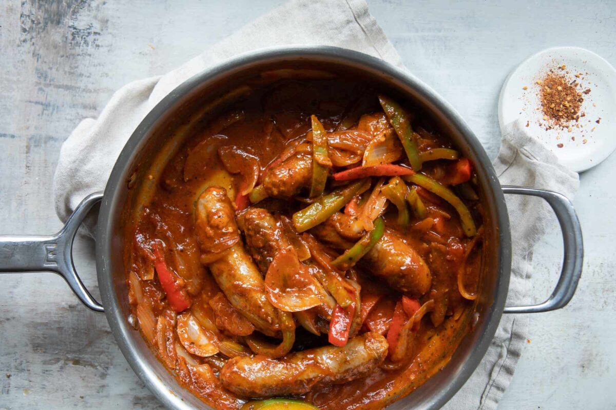 A skillet of sausage and peppers.