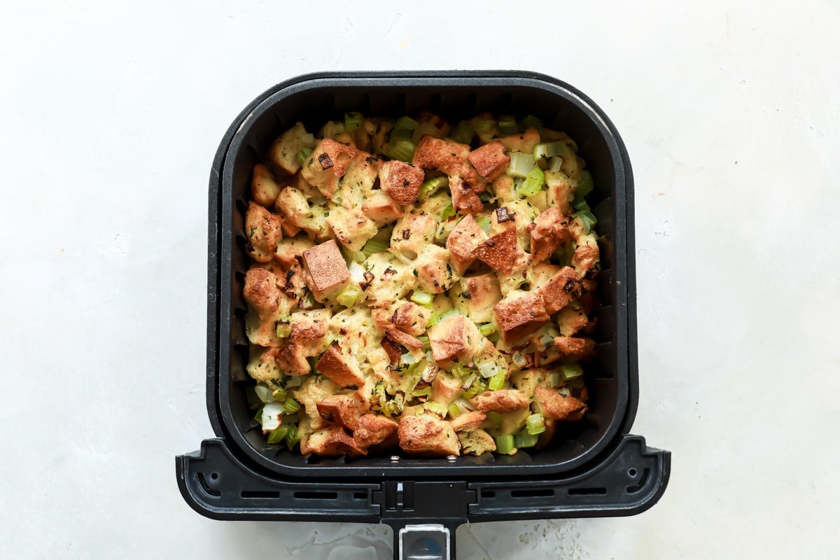 Stuffing in an air fryer basket.