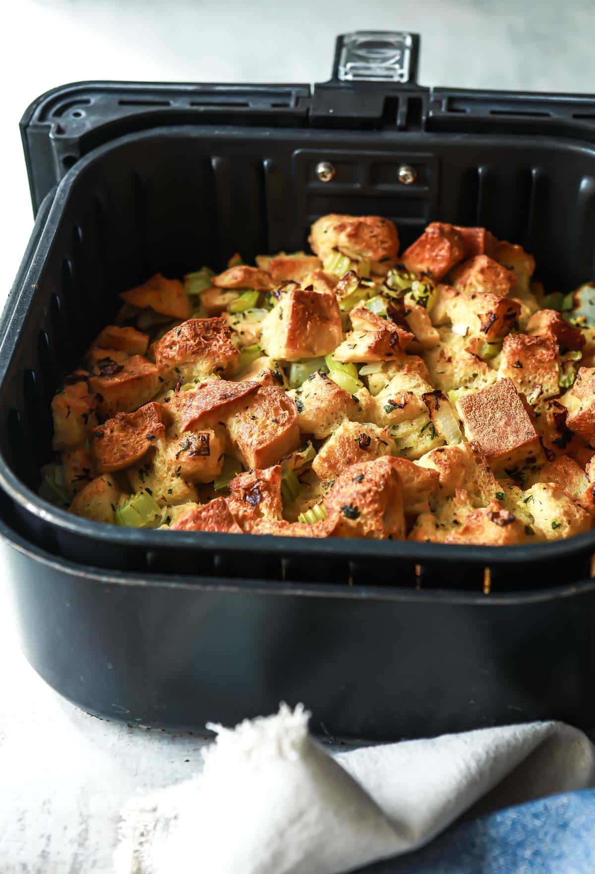 Stuffing in an air fryer basket.