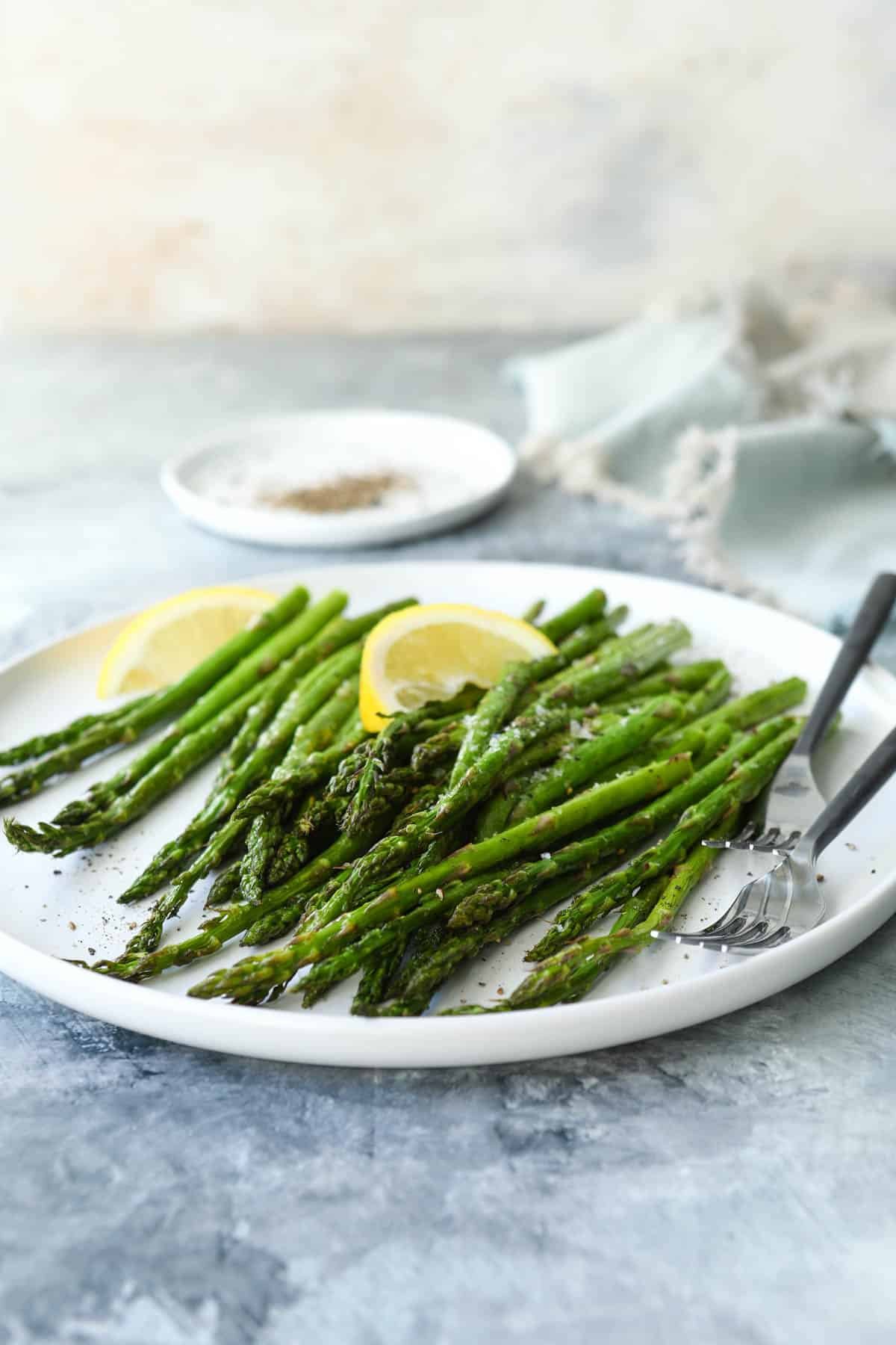 A plate of air fried asparagus.