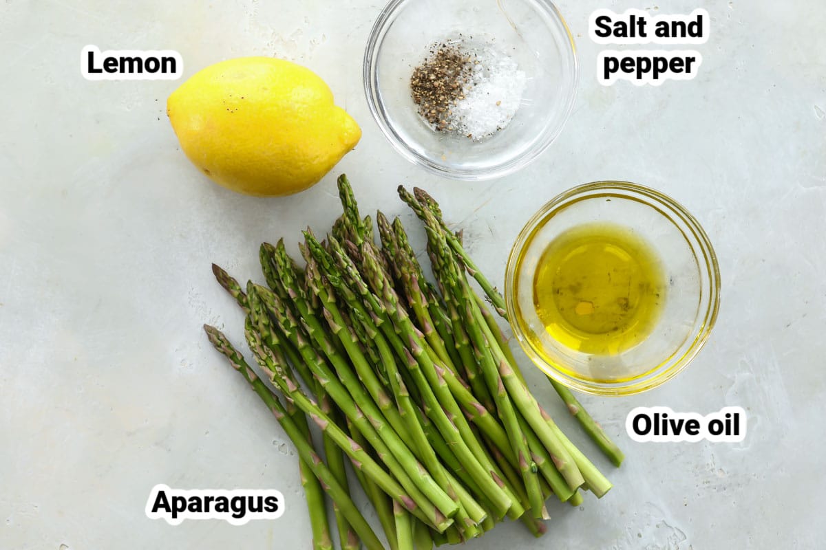 Labeled ingredients for air fryer asparagus.