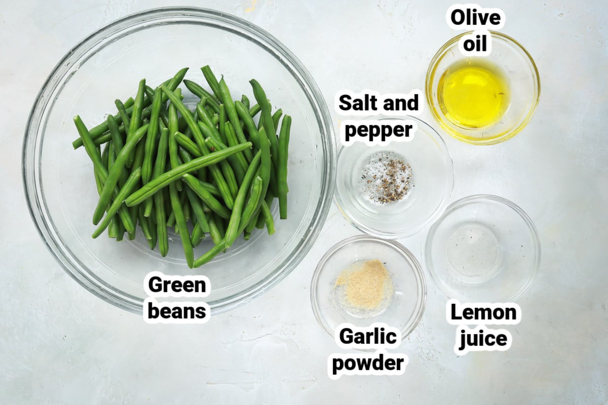 Labeled ingredients for air fryer green beans.