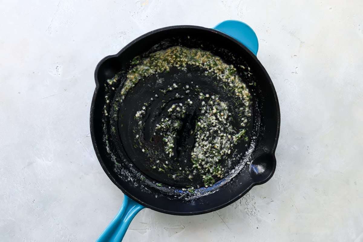 Garlic and butter in a cast iron skillet.