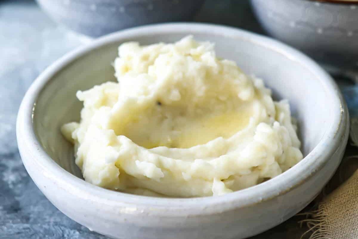 A bowl of sour cream mashed potatoes.