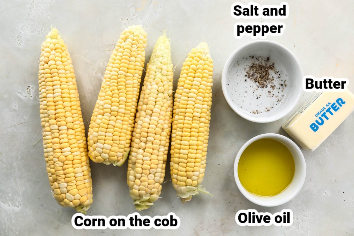 Labeled ingredients for air fryer corn on the cob.