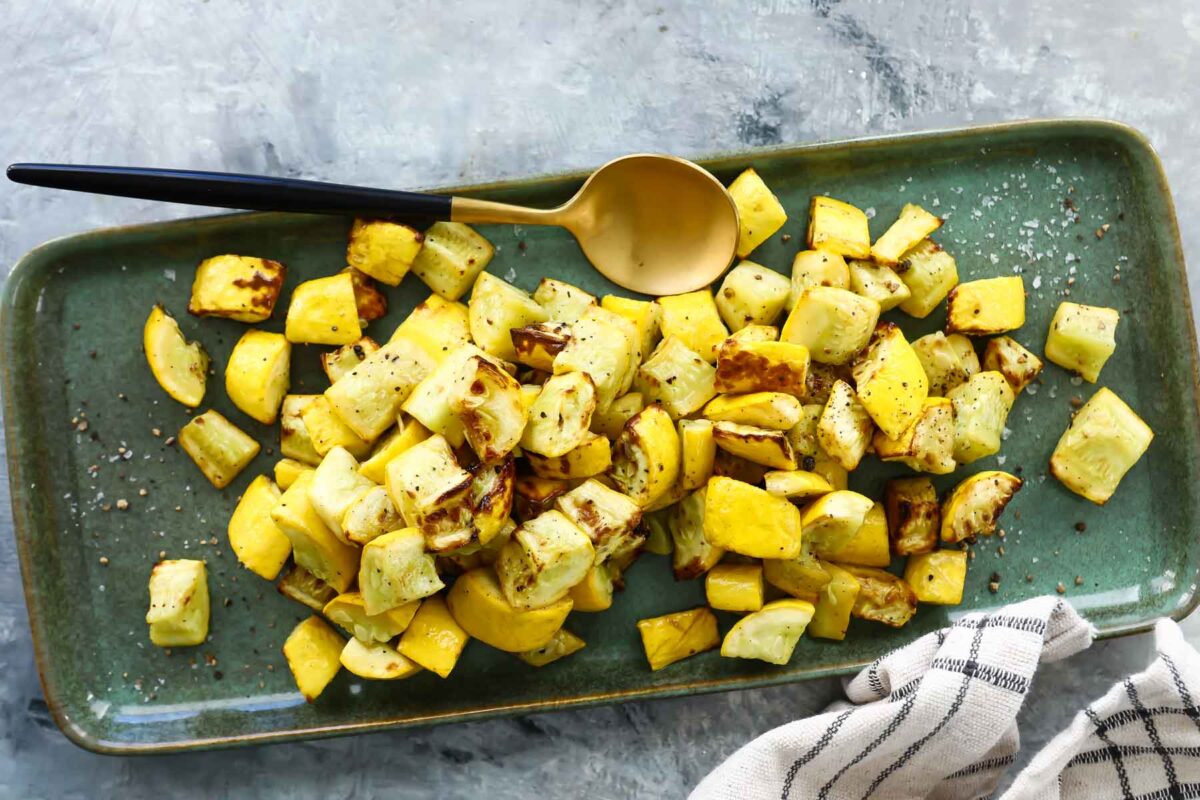 Air fryer squash on a rectangular platter.