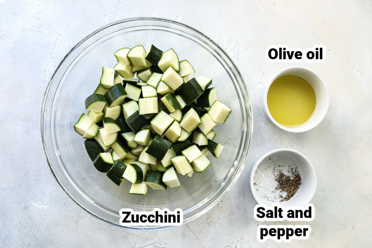 Labeled ingredients for air fryer zucchini.
